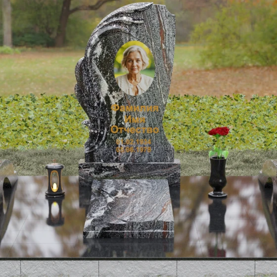 Гранитный памятник с барельефом крыла и птицы, гранит амфиболит, вид 2