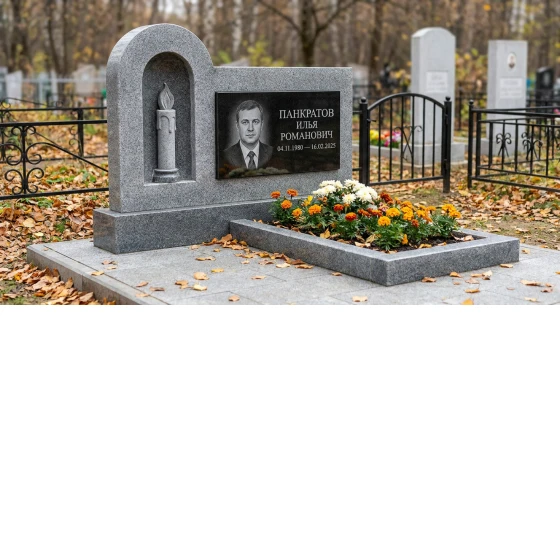 Мемориал с зажженной свечой из мансуровского гранита